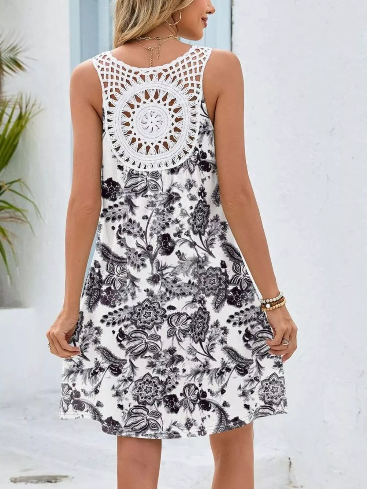 Floral Print V-Neck Crochet Back Mini Dress by Trendsi