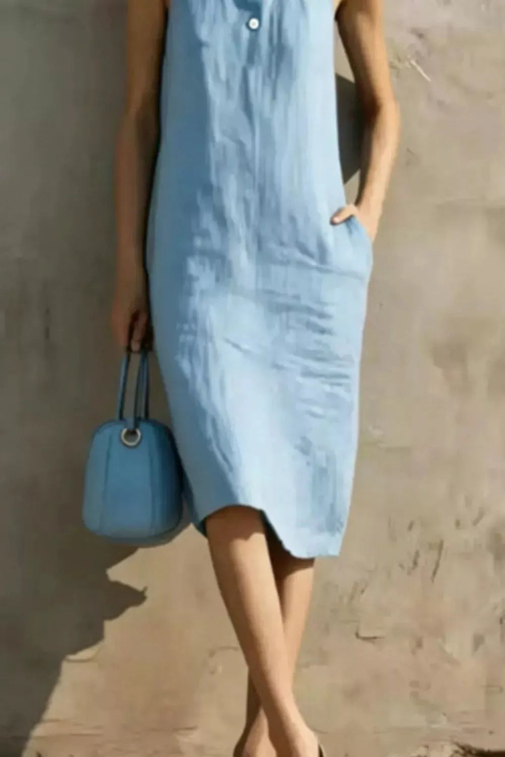 Casual Sleeveless Button Detail Midi Dress by Trendsi