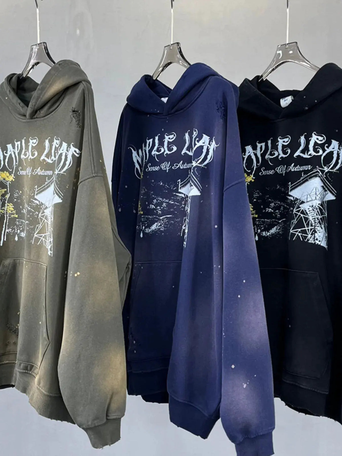 Men's Graphic Long Sleeve Hoodie by Trendsi