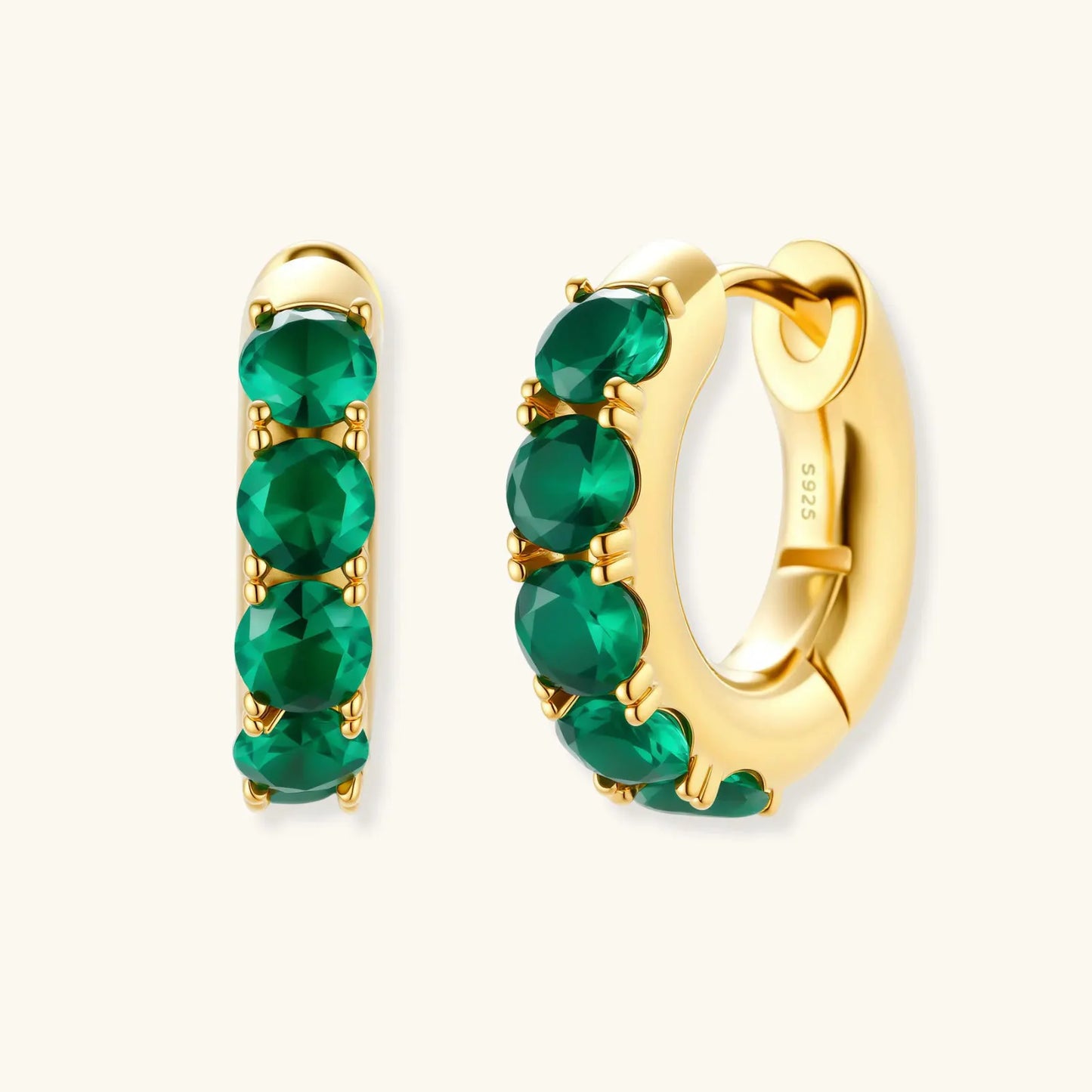 Emerald Huggie Hoops by Equanimity Essence.