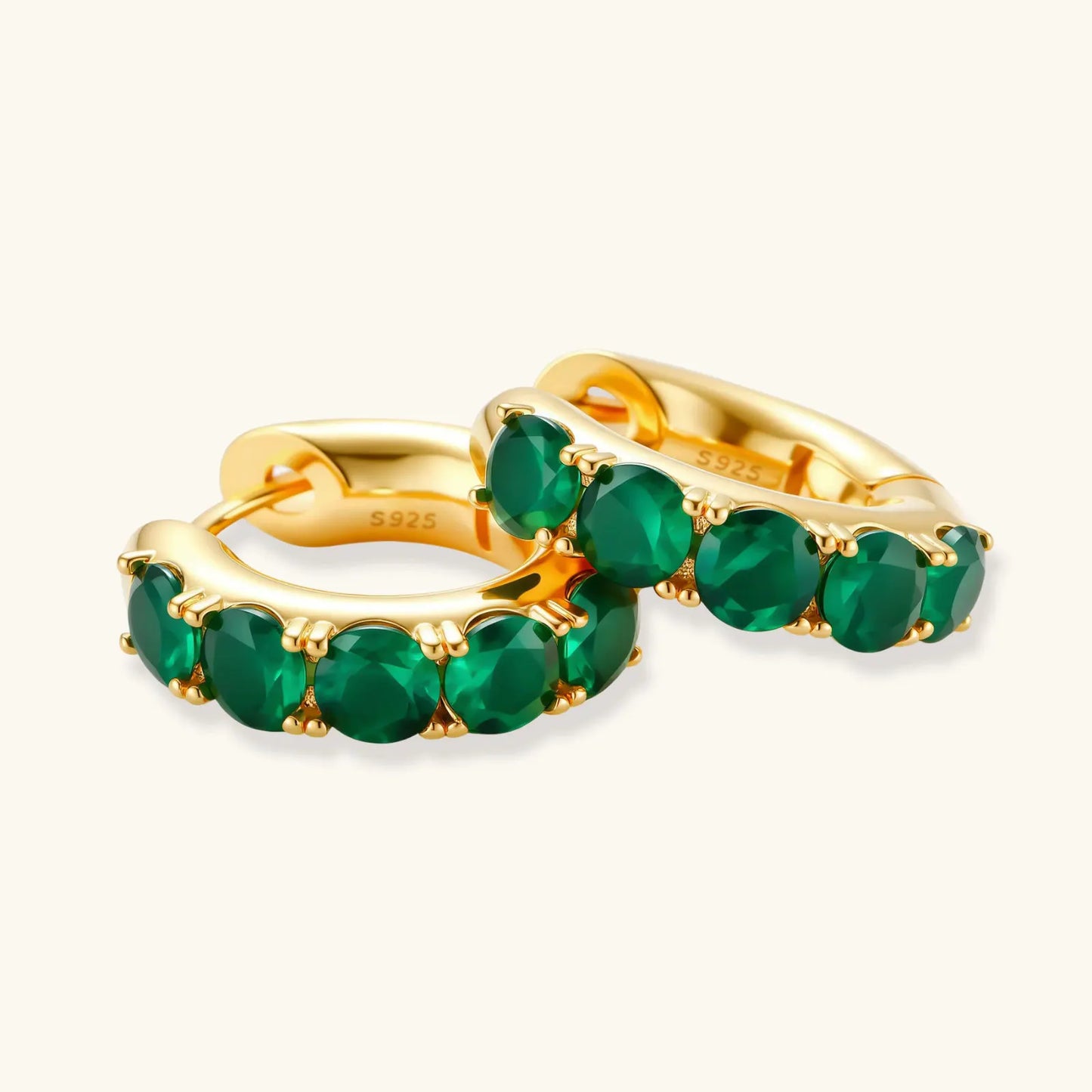 Emerald Huggie Hoops by Equanimity Essence.