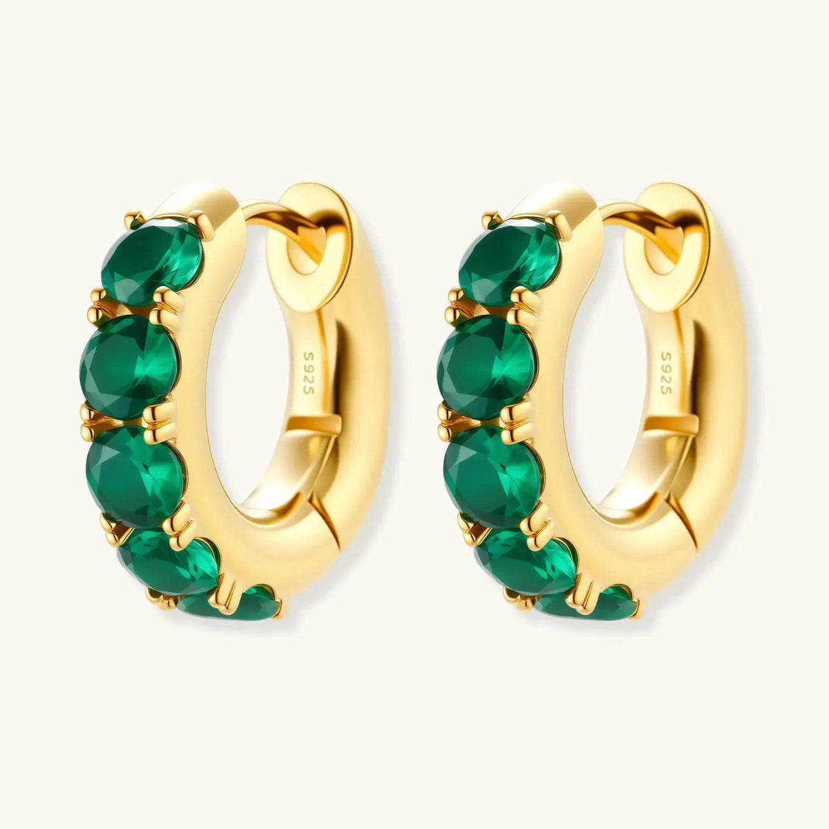 Emerald Huggie Hoops by Equanimity Essence.