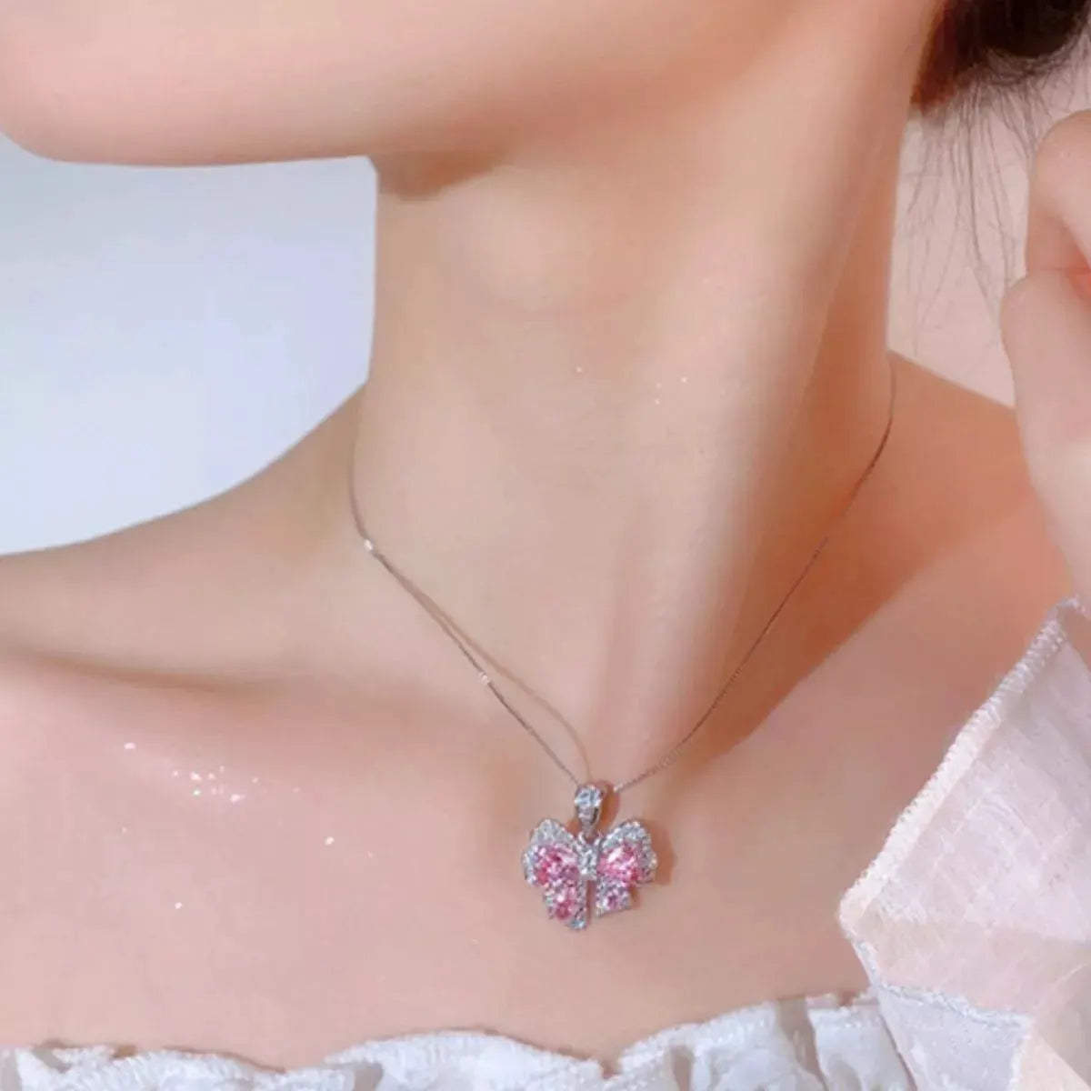 Zircon Bow Pendant Necklace by Partner Labels