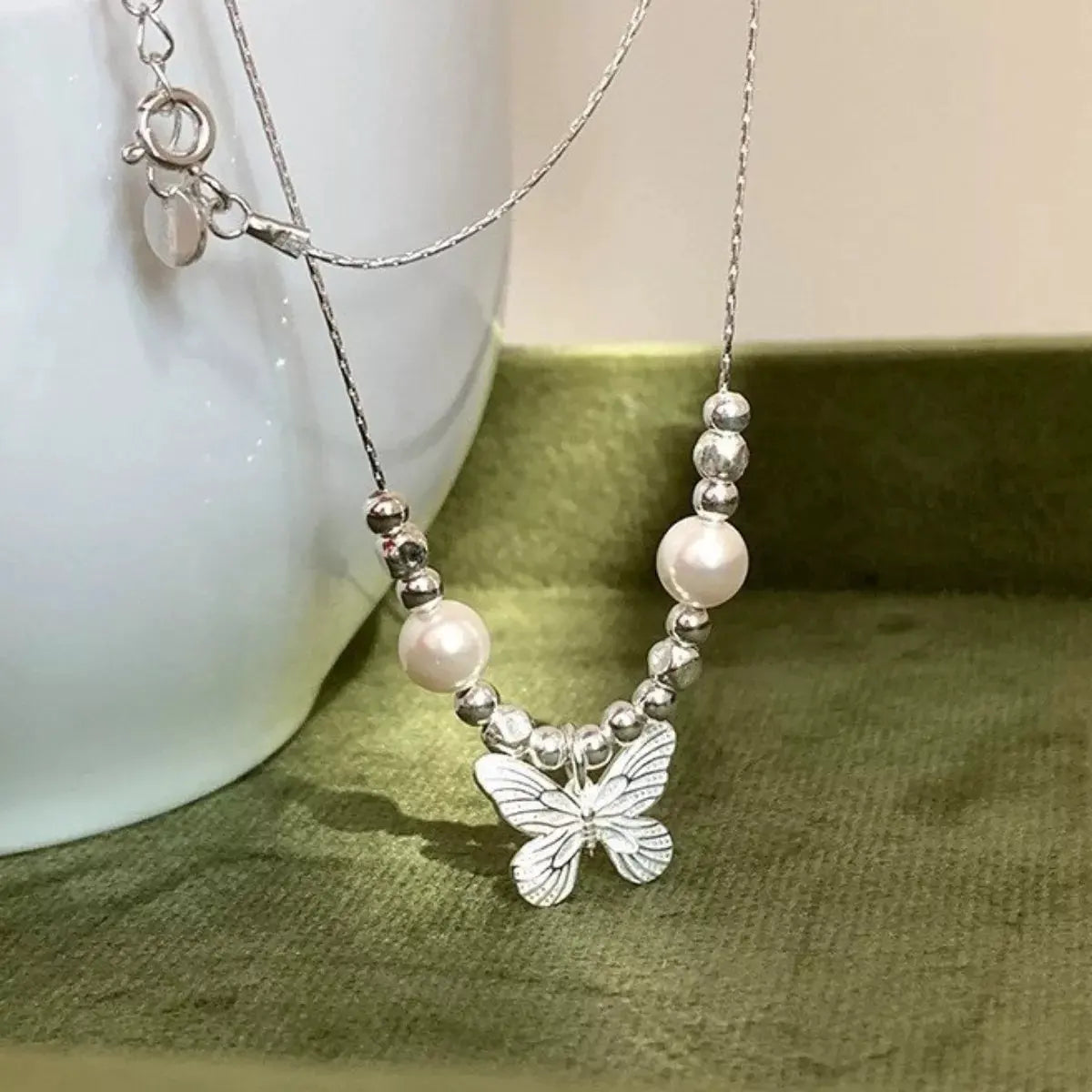 Butterfly Pearl Pendant Necklace by Partner Labels