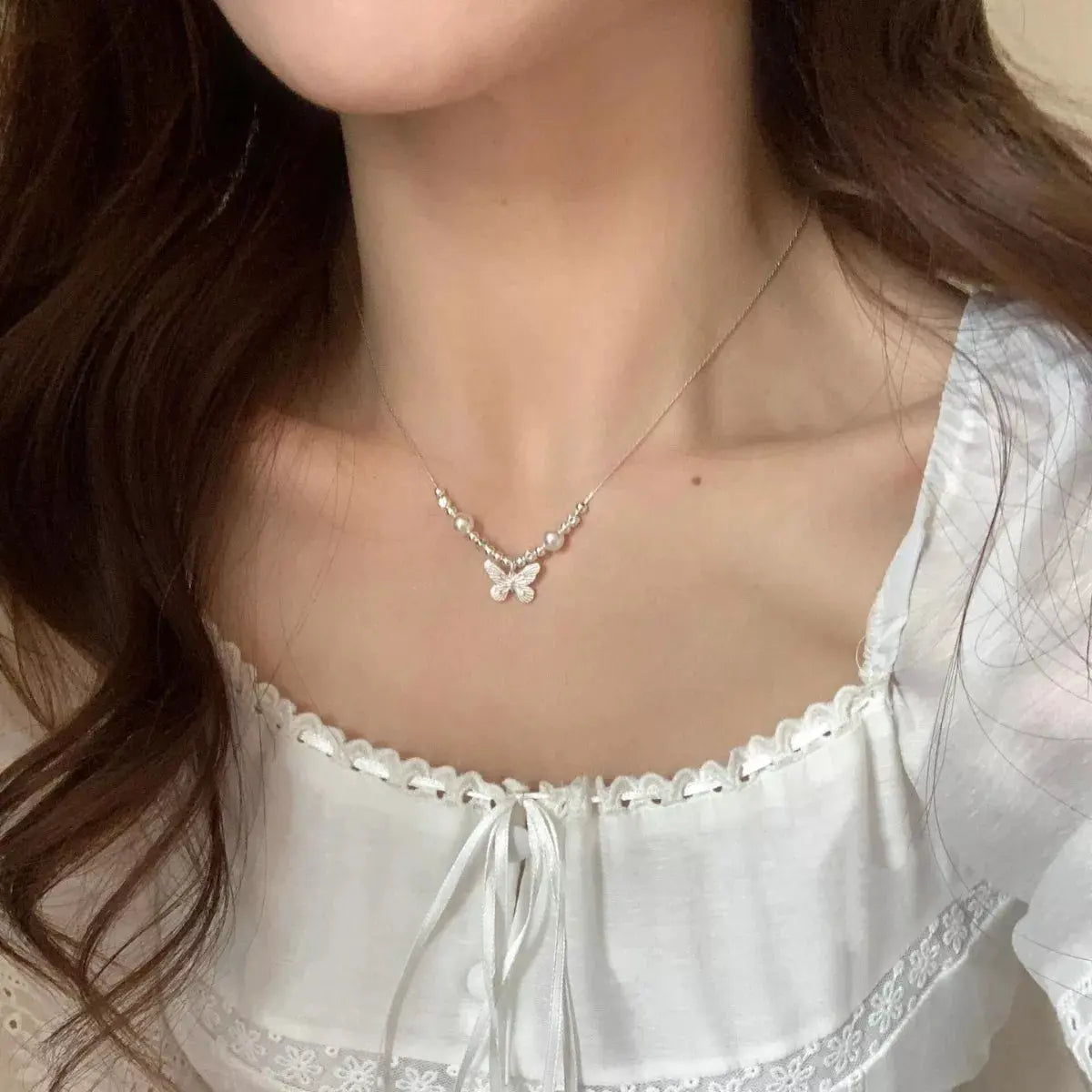 Butterfly Pearl Pendant Necklace by Partner Labels