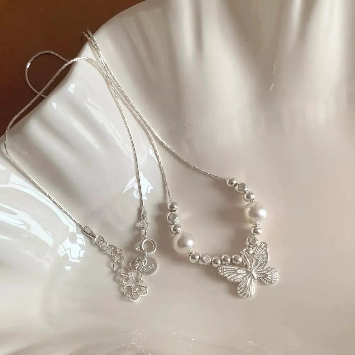 Butterfly Pearl Pendant Necklace by Partner Labels