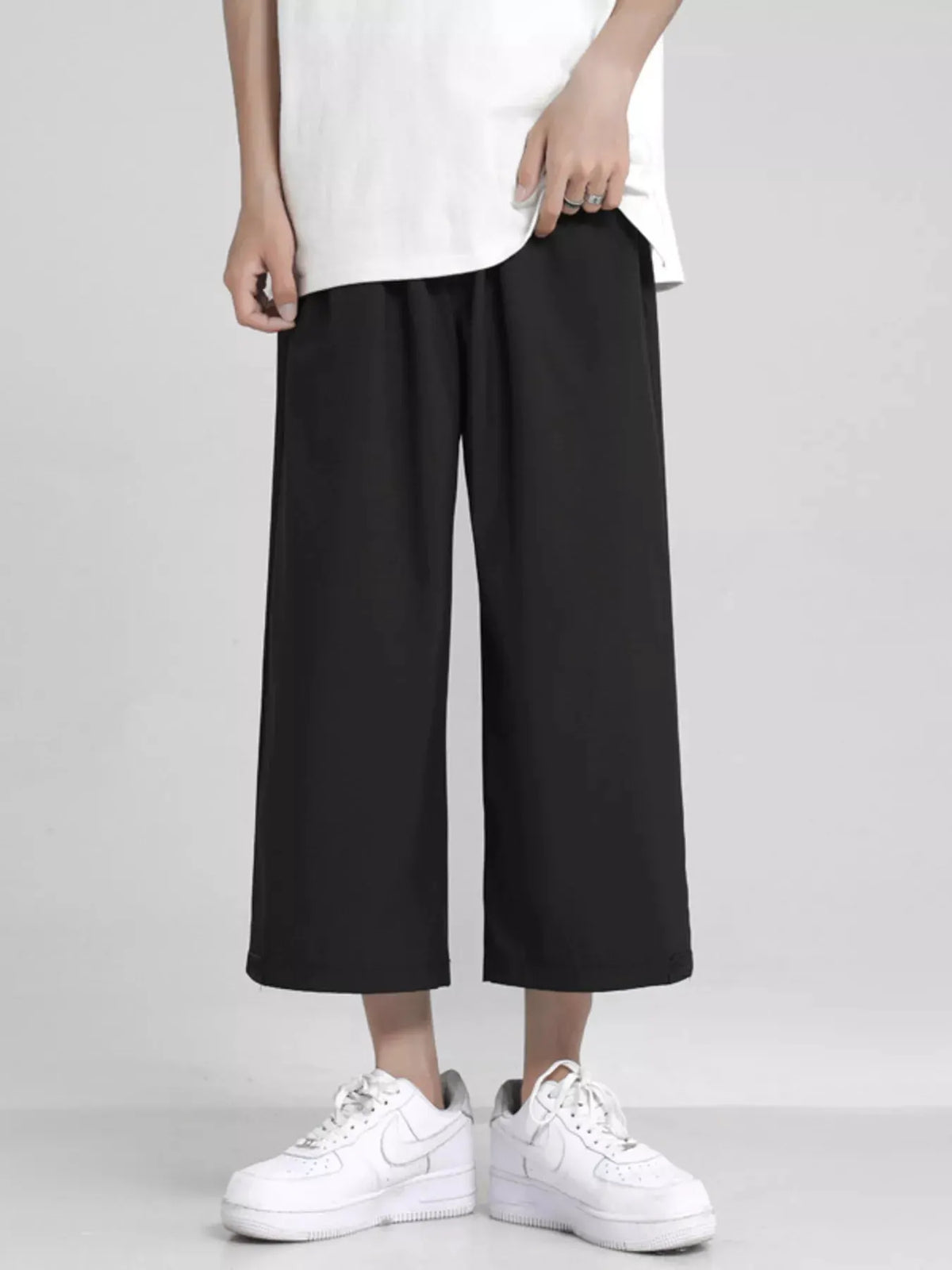 Men's Full Size Loose Fit Cropped Pants Plus Size by Trendsi