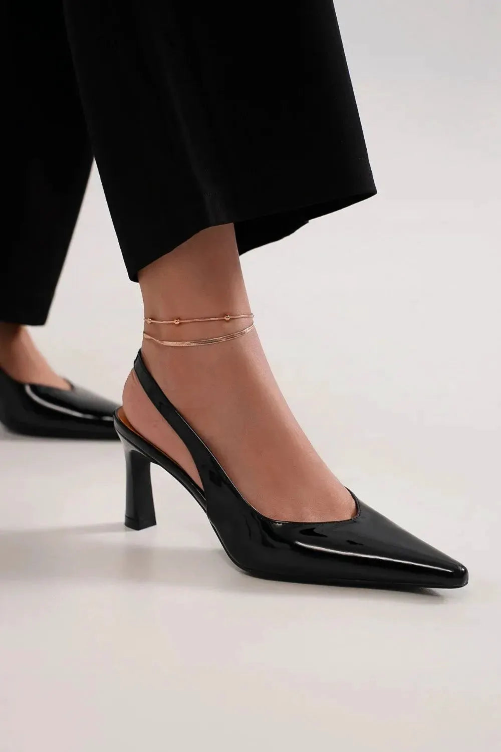 Beast Fashion Faux Leather Point Toe Slingback Pumps by Beast Fashion