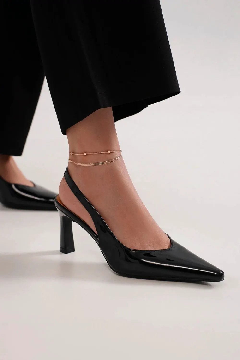 Beast Fashion Faux Leather Point Toe Slingback Pumps by Beast Fashion