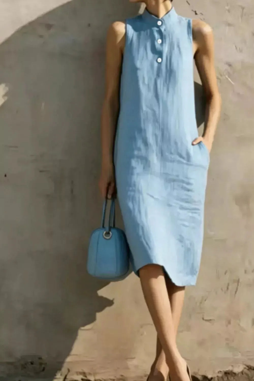 Casual Sleeveless Button Detail Midi Dress by Trendsi