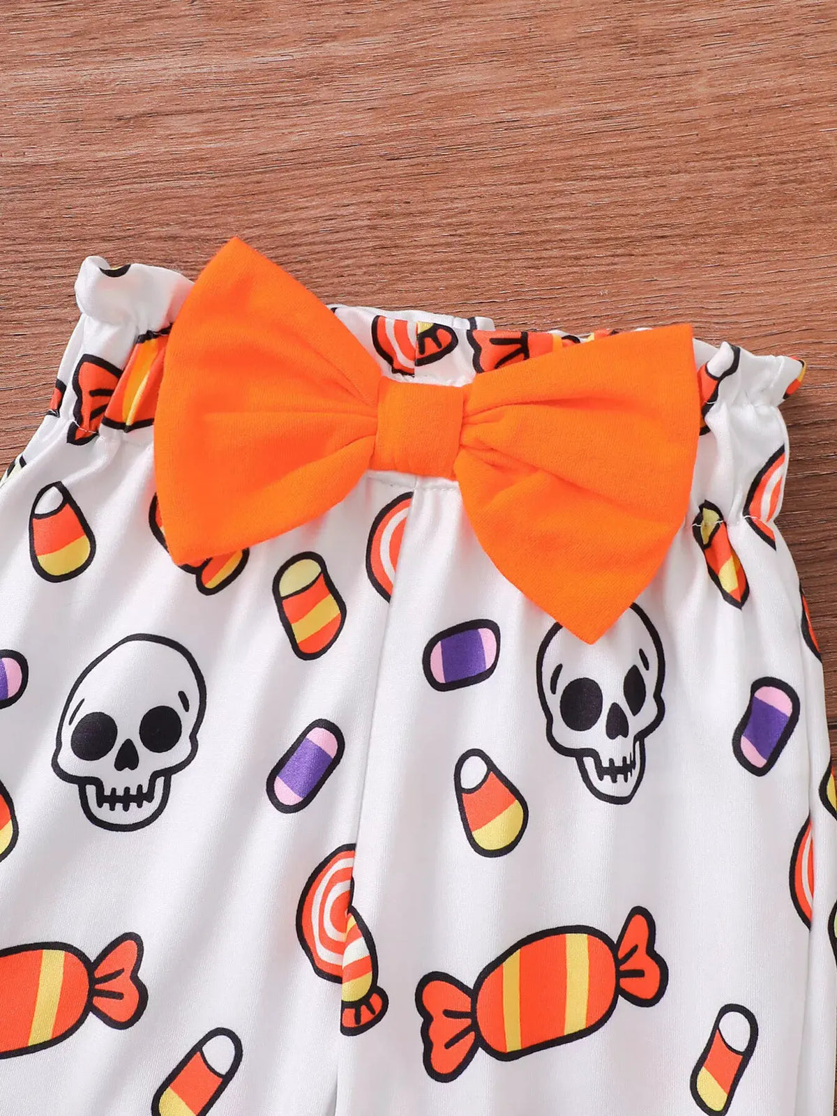 Children's Halloween Skull Print Long Sleeve Bodysuit and Pants Set with Bow Headband by Trendsi