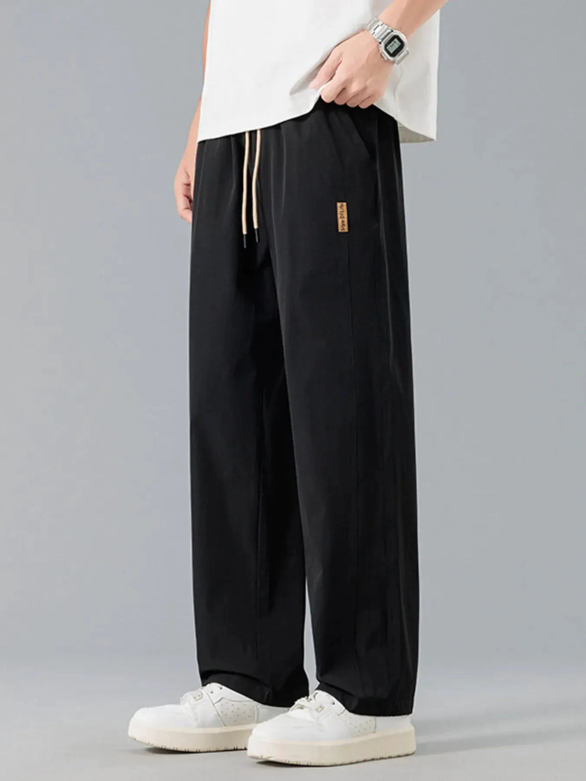 Men's Plus Size Loose Fit Drawstring Casual Pants by Trendsi