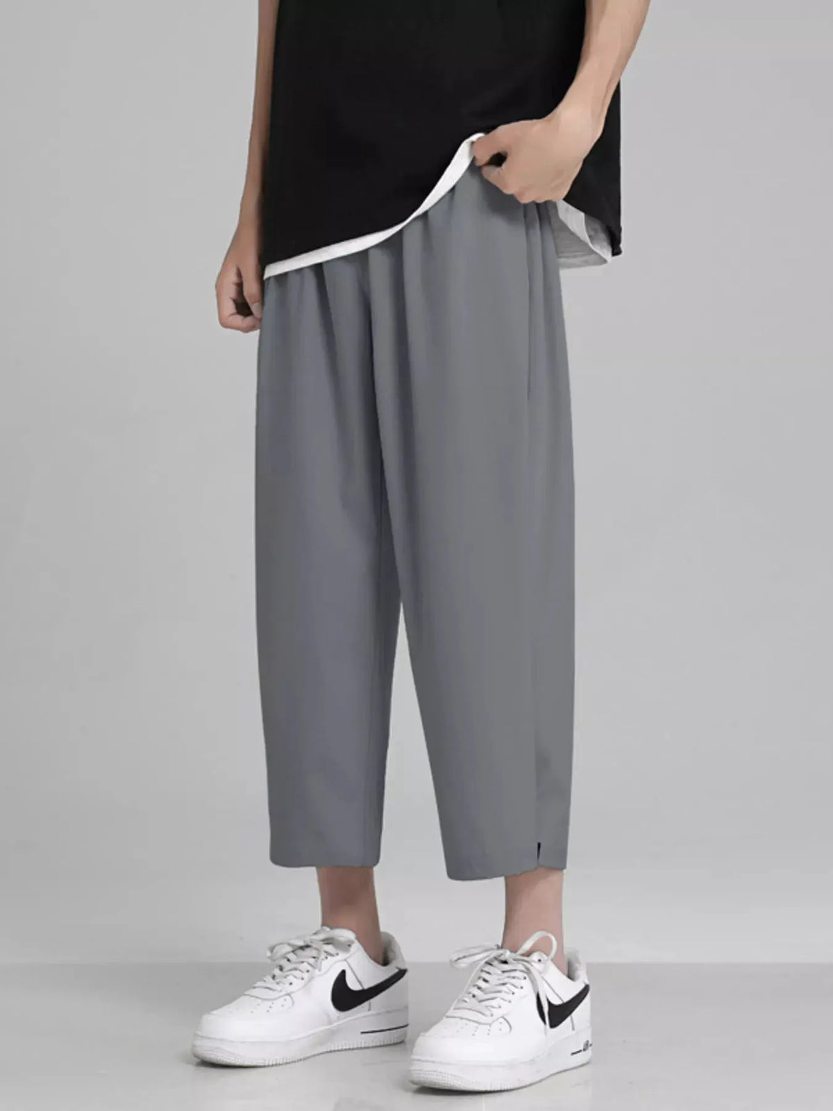 Men's Full Size Loose Fit Cropped Pants Plus Size by Trendsi