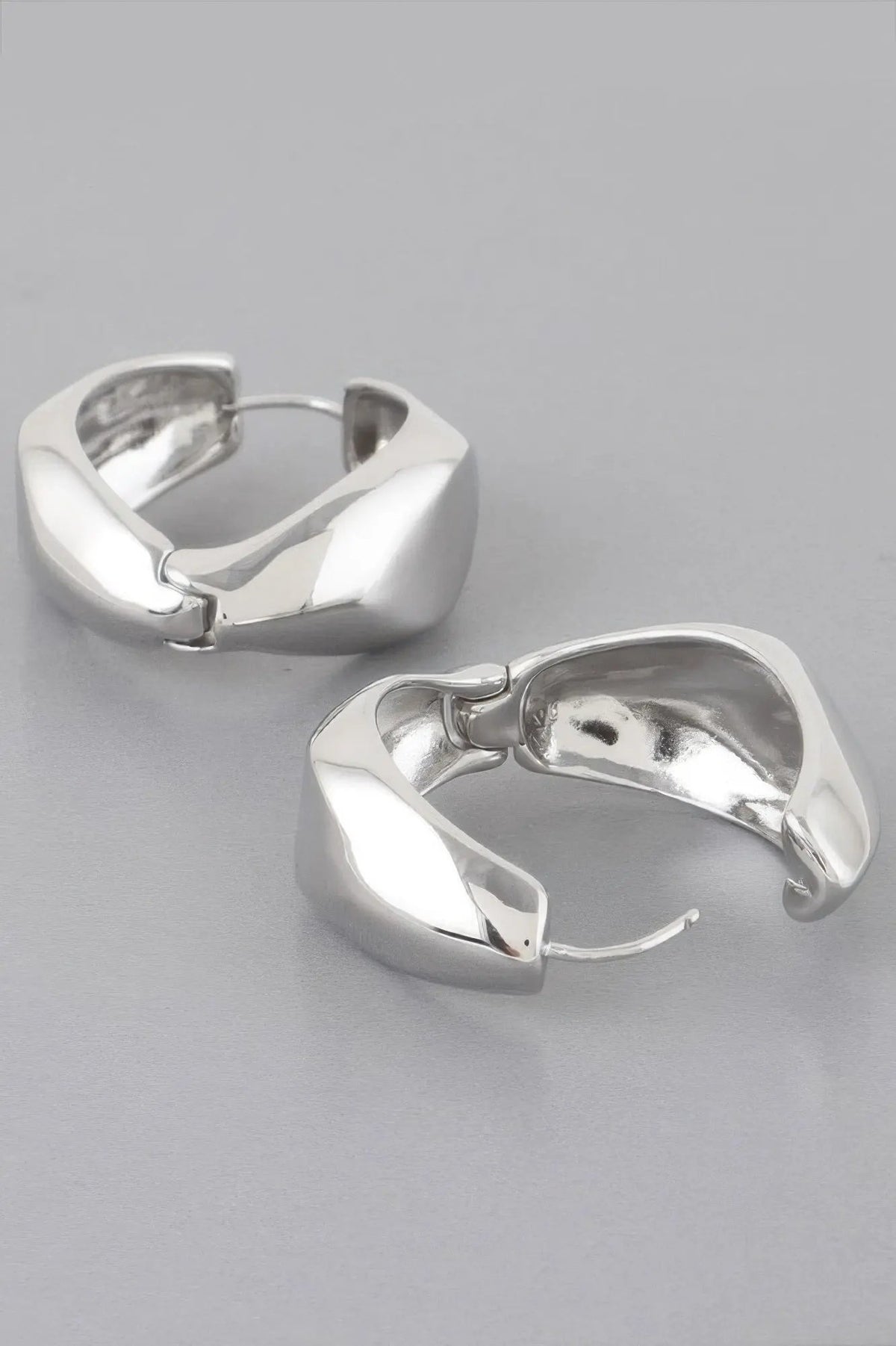 MEATPACKING Abstract Edge Hoop Earrings: NYFW BYMANYC ® New York by BYMANYC ® New York