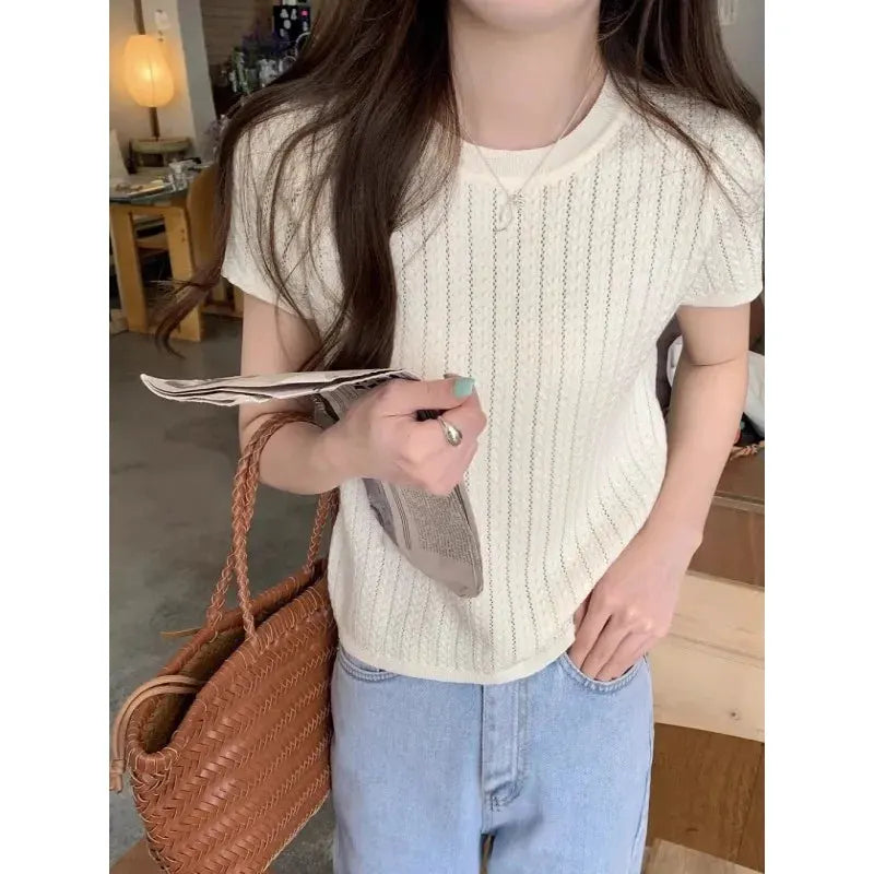 A hollowed-out round-neck ice silk knitted T-shirt for women in summer, a loose short-sleeved and slimming top, is thin by Vimost Shop