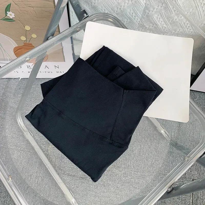 Women’s High-Waist Ankle-Length Yoga Leggings with Elastic Waist and Seam Pockets by Vimost Shop