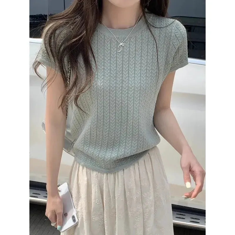 A hollowed-out round-neck ice silk knitted T-shirt for women in summer, a loose short-sleeved and slimming top, is thin by Vimost Shop