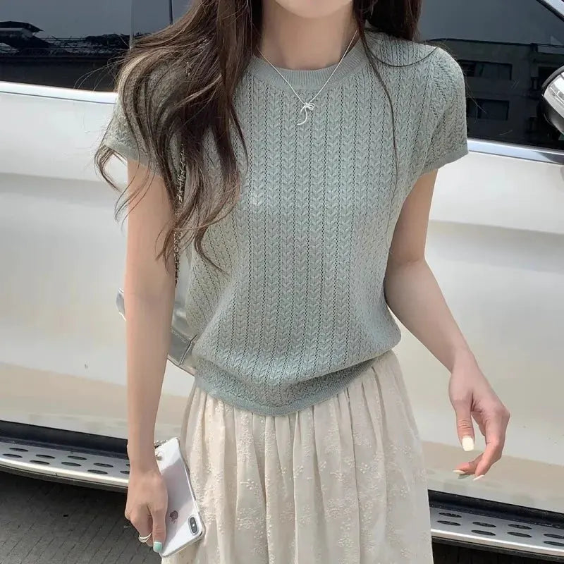 A hollowed-out round-neck ice silk knitted T-shirt for women in summer, a loose short-sleeved and slimming top, is thin by Vimost Shop