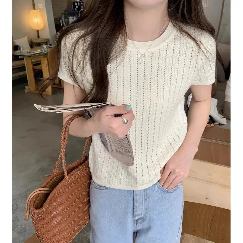A hollowed-out round-neck ice silk knitted T-shirt for women in summer, a loose short-sleeved and slimming top, is thin by Vimost Shop