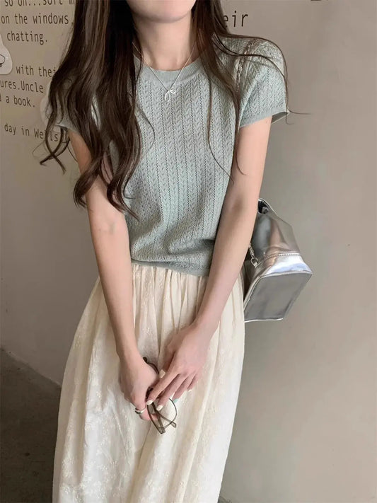 A hollowed-out round-neck ice silk knitted T-shirt for women in summer, a loose short-sleeved and slimming top, is thin by Vimost Shop