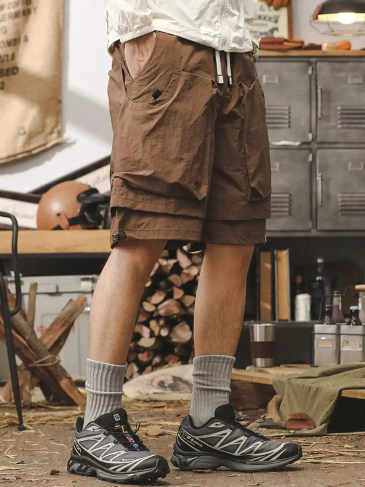Men's Plus Size Multiple Pocket Layered Cargo Shorts with Drawstring Hem by Trendsi