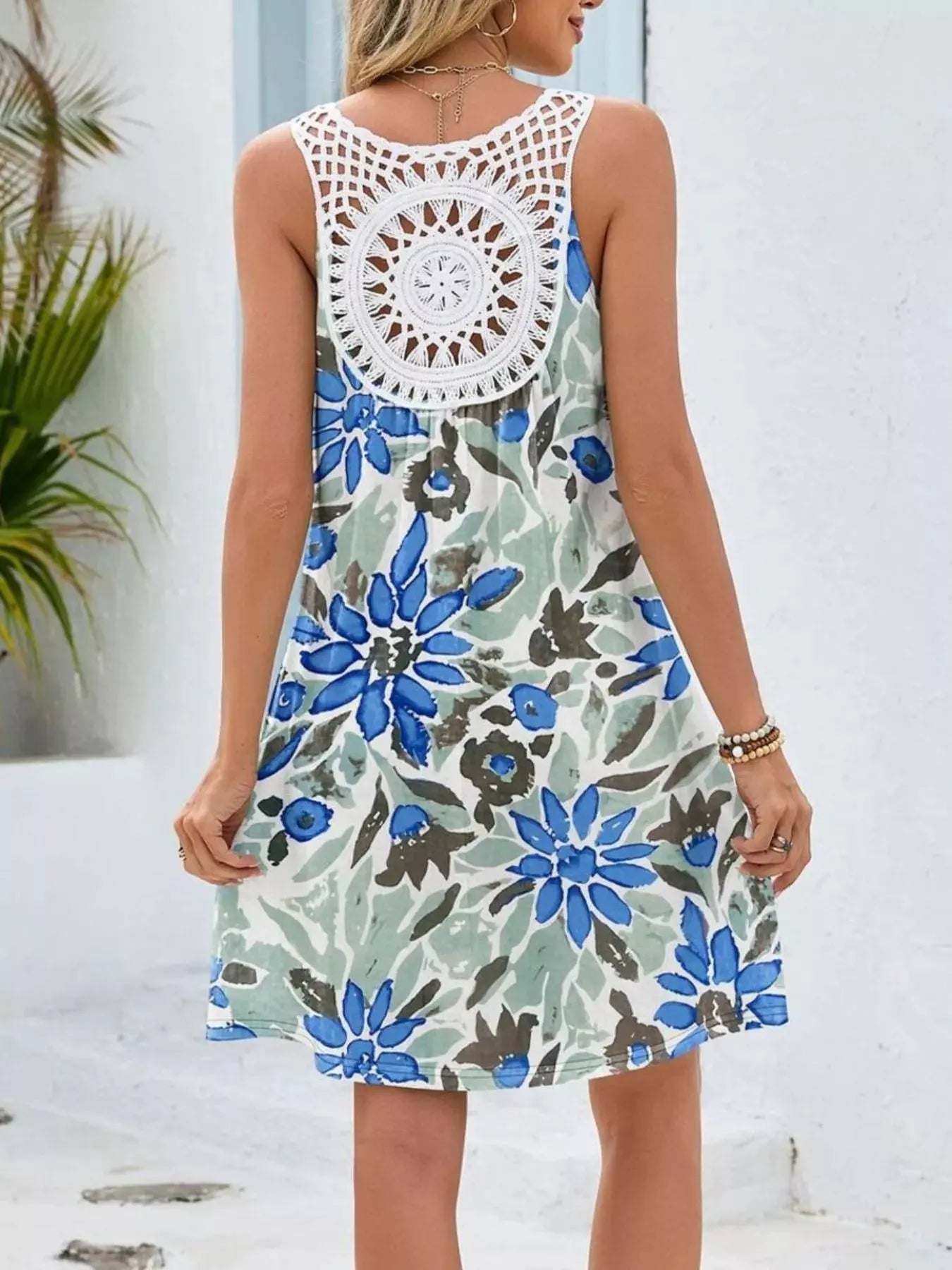 Floral Print V-Neck Crochet Back Mini Dress by Trendsi