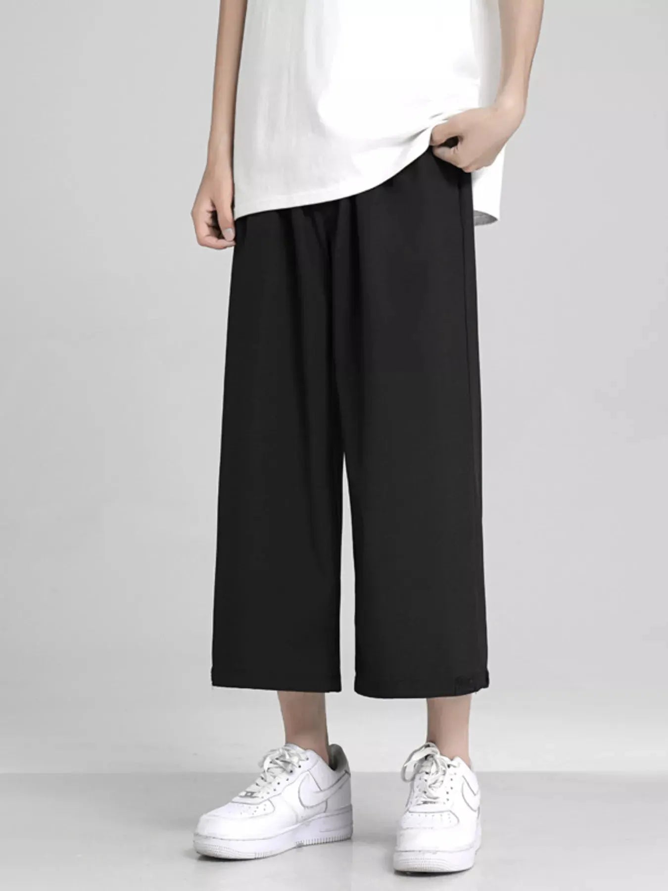 Men's Full Size Loose Fit Cropped Pants Plus Size by Trendsi