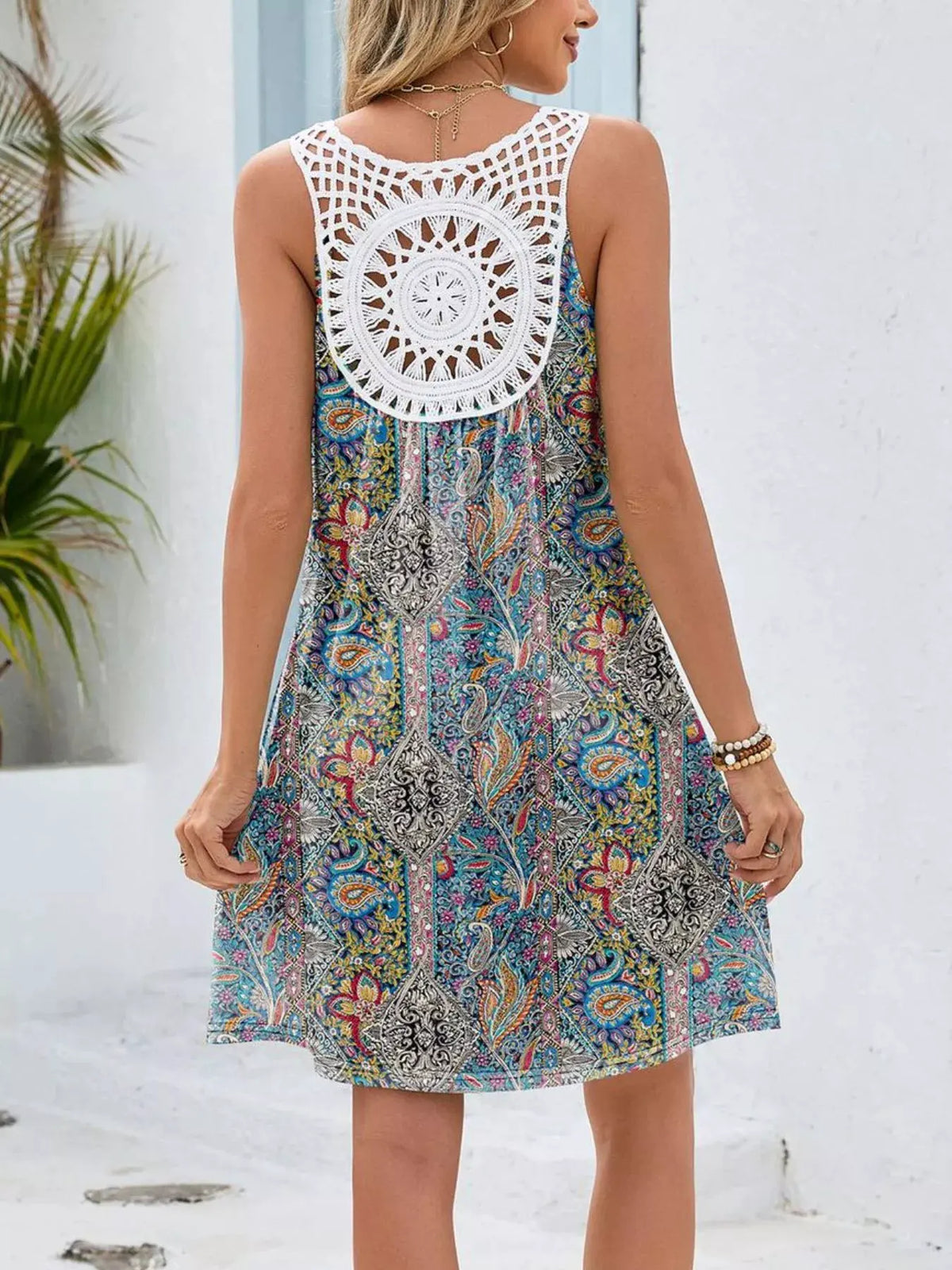 Floral Print V-Neck Crochet Back Mini Dress by Trendsi