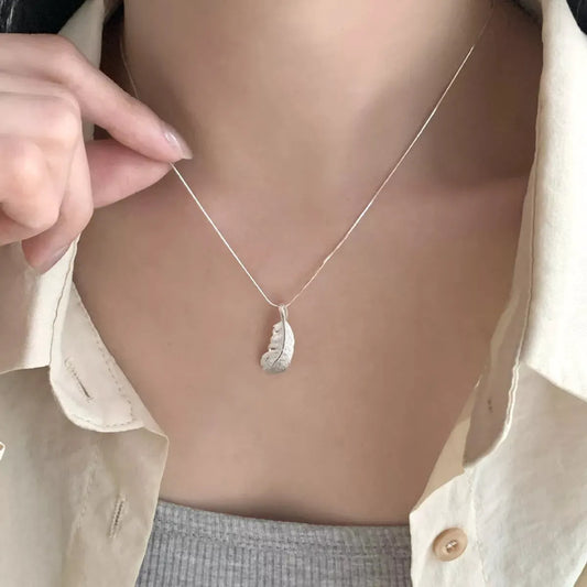 Feather Pendant Necklace by Partner Labels