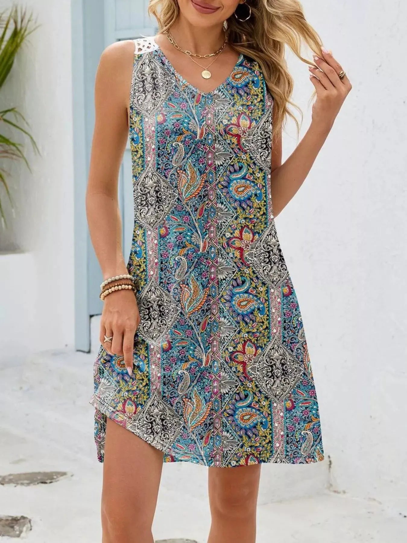 Floral Print V-Neck Crochet Back Mini Dress by Trendsi