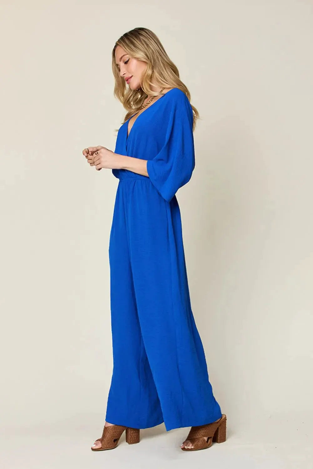 Double Take Full Size Surplice Wide Leg Jumpsuit with Pockets by Double Take