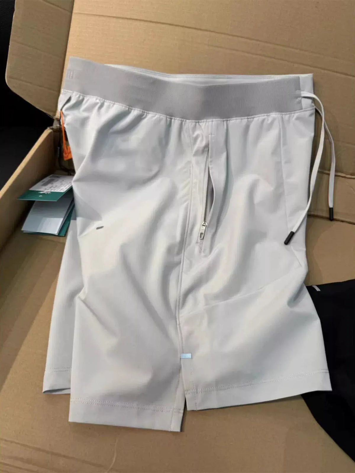 Men's Plus Size Lightweight Athletic Shorts with Drawstring Waist by Trendsi