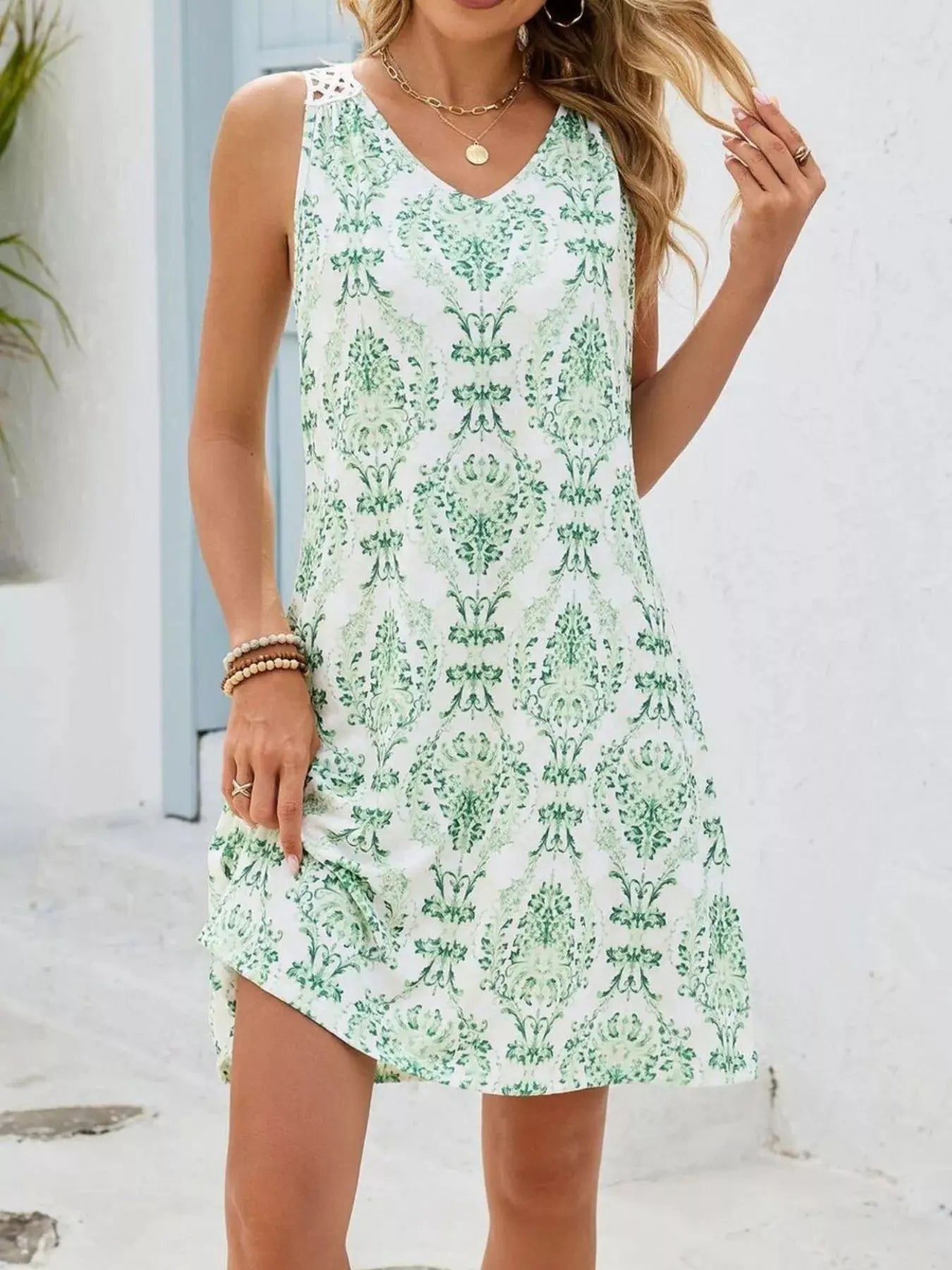 Floral Print V-Neck Crochet Back Mini Dress by Trendsi