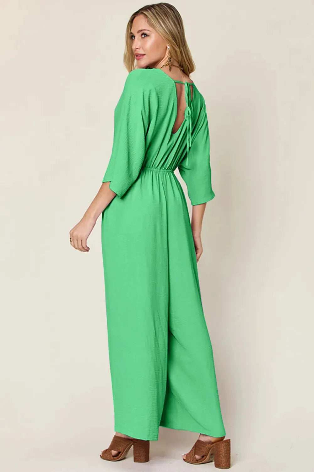 Double Take Full Size Surplice Wide Leg Jumpsuit with Pockets by Double Take