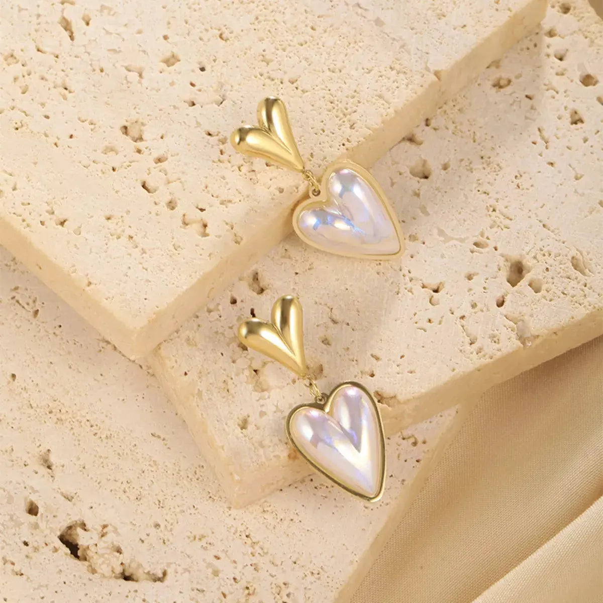Heart-Shaped Pearl Drop Earrings by Partner Label