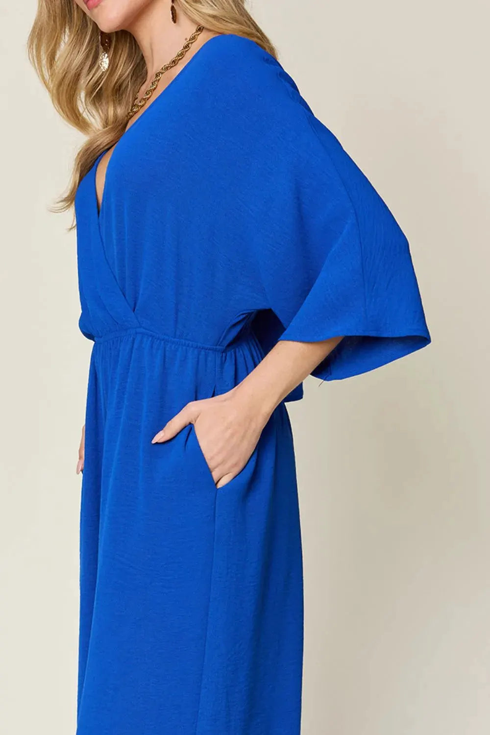 Double Take Full Size Surplice Wide Leg Jumpsuit with Pockets by Double Take