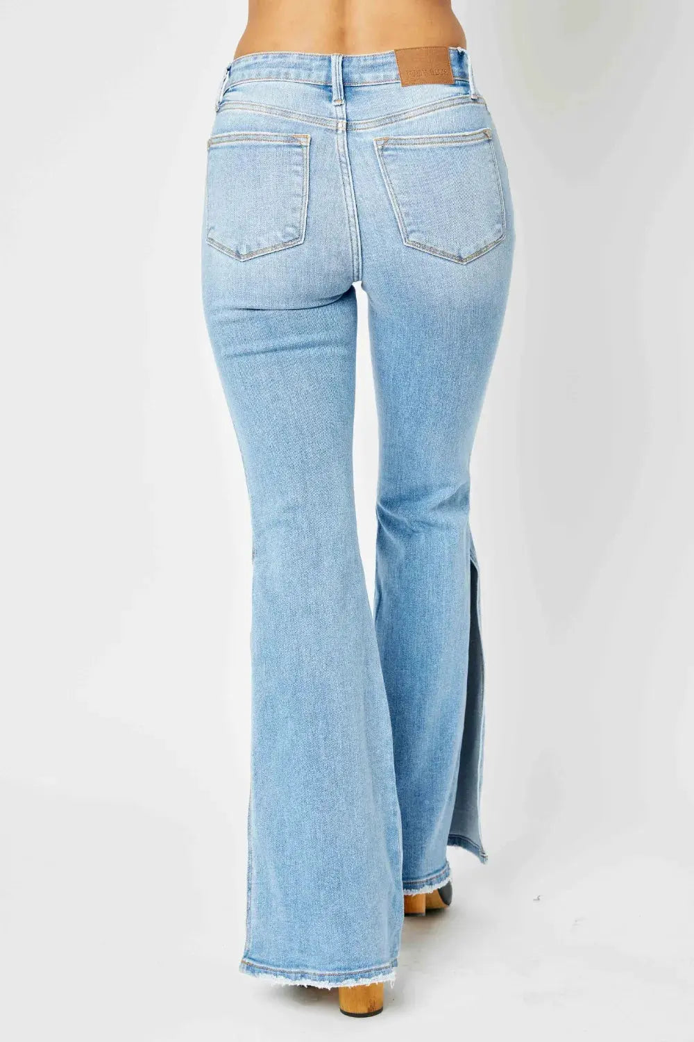 Judy Blue Full Size Mid Rise Raw Hem Slit Flare Jeans by Judy Blue